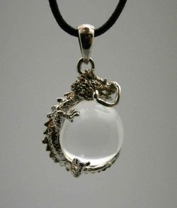 Ciondolo e anello con occhio di tigre