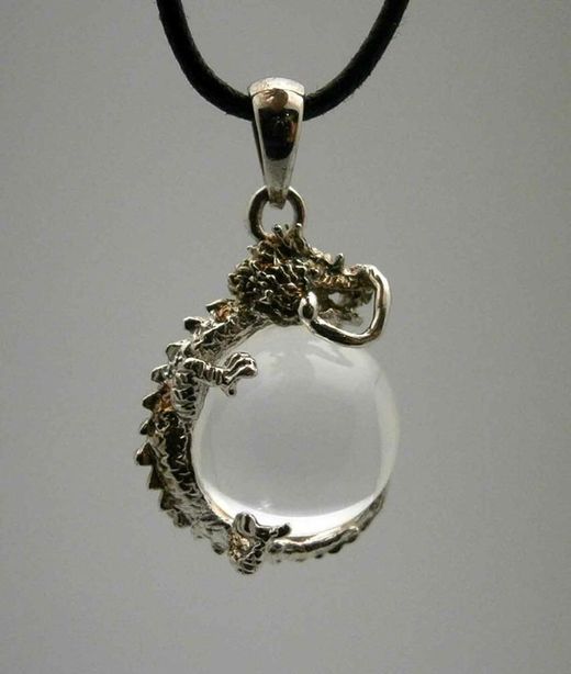 Ciondolo e anello con occhio di tigre